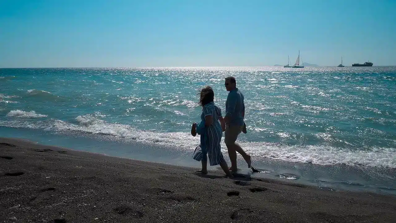 Guests on a private Santorini day tour at a caldera viewpoint