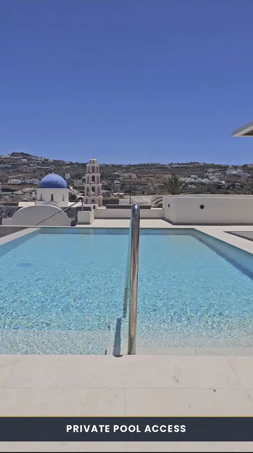 Private pool access with sun loungers and blue dome views, operated by Santorini Day Tours